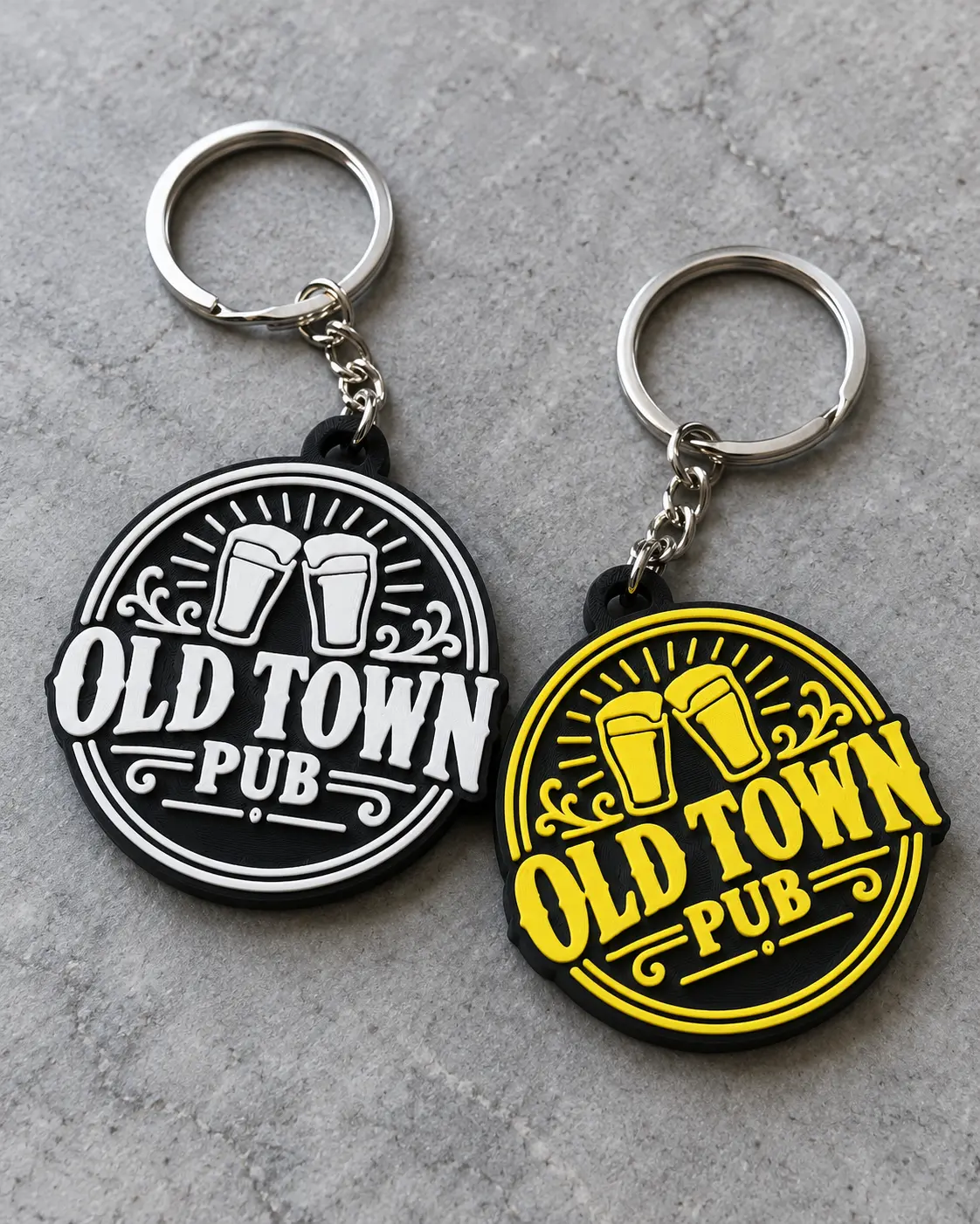 Black and yellow Old Town Pub logo keyrings with metal rings