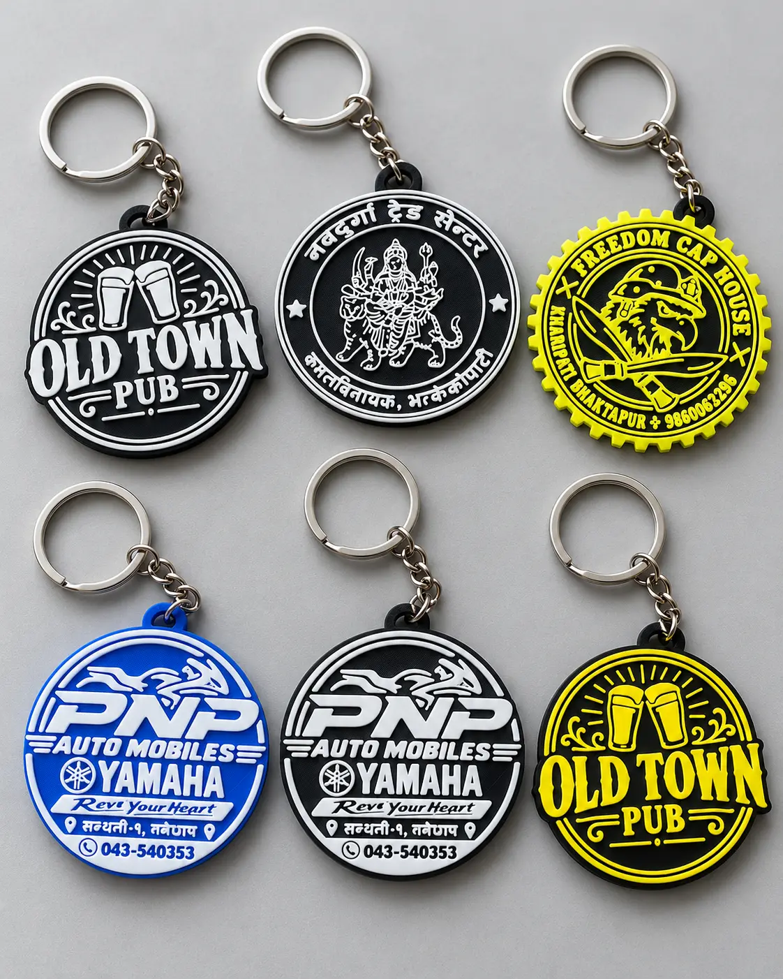A selection of company logo keyrings in different colours and designs
